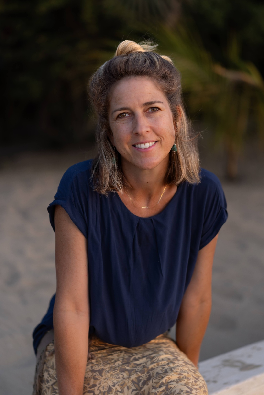 Anna, founder of The Cabanas Lamu — portrait at golden hour on the beach