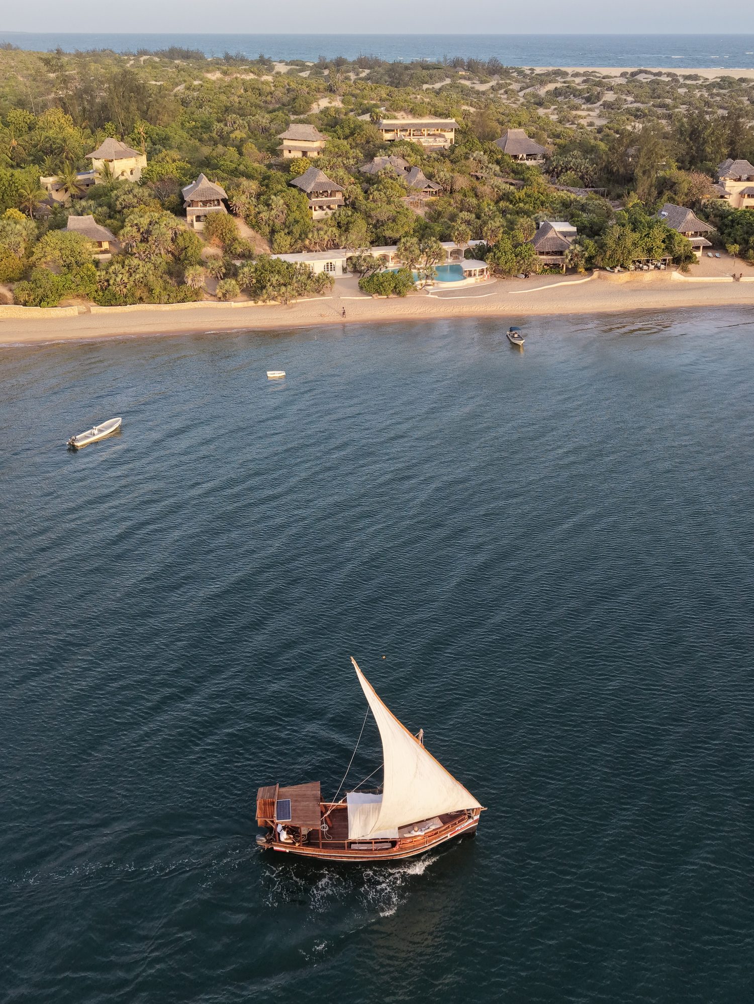 Curtained view to dhows on the beach