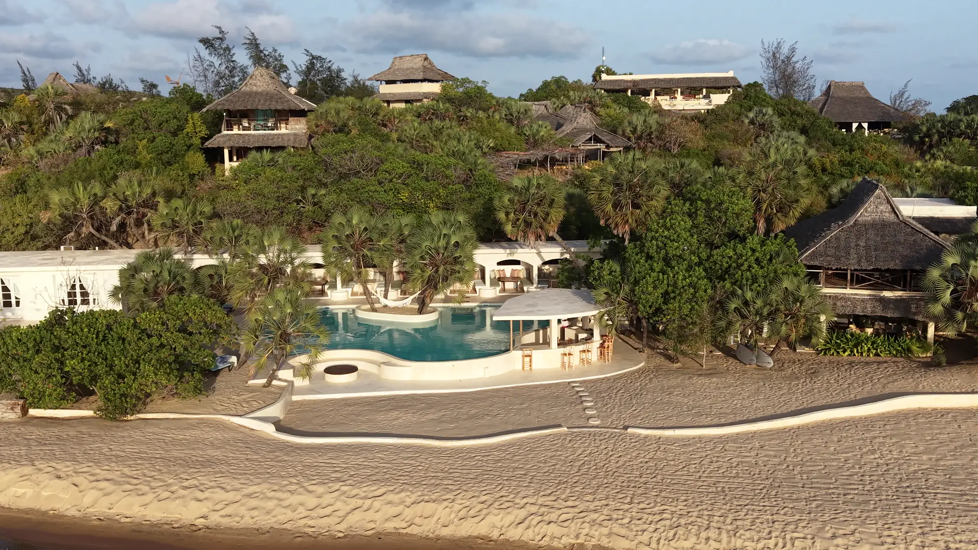 The pool and beachfront cabanas at Kizingoni Beach, Lamu, seen from the air